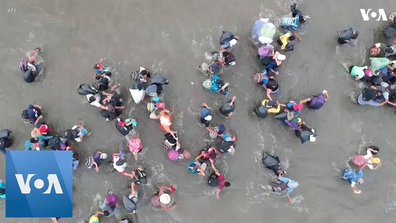 Drone Images of Migrants Crossing into Mexico Through River - YouTube