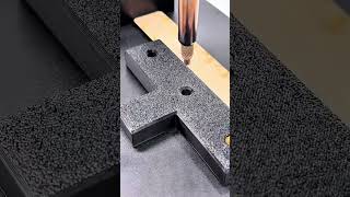 Tweezers place heated brass insert into plastic component