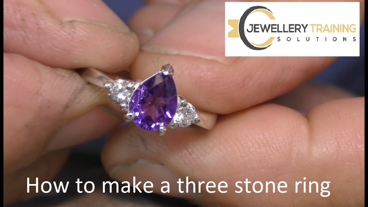 Three stone pear shape ring