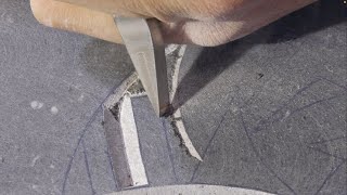 carving limestone with pneumatic hammer