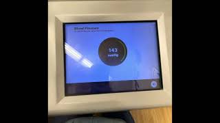 Mom takes her blood pressure at Rite Aid pharmacy