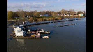De Werking Van Geotextiele Tubes Gevuld Met Baggerspecie Voor Uitbreiding Camping Zeeburg
