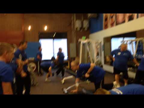 Bill Phillips, Joe Vitale flexing at Transformation Camp