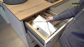 Download Lagu Kitchen by Nolte Küchen | Interior Organisation in real oak wood with foil/film dispenser MP3