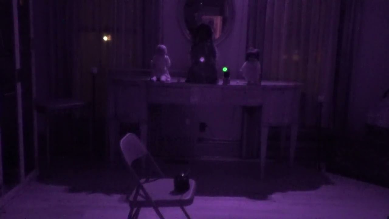 Haunted Doll lets us know she's here. Asher-Walton House