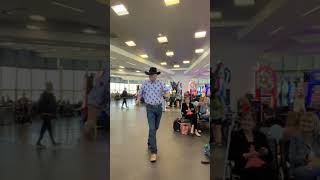 Cowboy in Las Vegas Airport dancing like a Soul Train episode