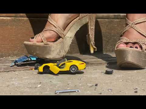 Crushing small car for fun.