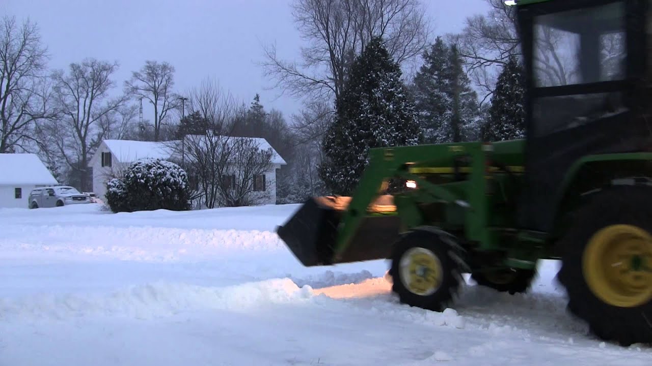 Plowing snow with the John Deere 790 Compact Tractor with Original