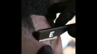 Potong rambut versi peci sangat unik sekali