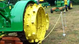 John Deere D running on 4 glass Coke bottles