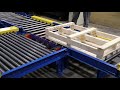 CDLR Pallet Conveyor with air operated pop-up chain transfers, a workstation and gravity section