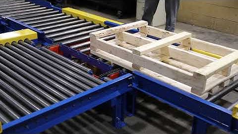 CDLR Pallet Conveyor with air operated pop-up chain transfers, a workstation and gravity section