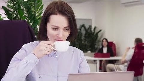 Working And Drinking Coffee Stock Video