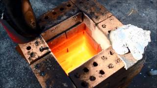 Steel melt in Home Brick furnace.