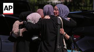 People gather at San Diego mosque a day after deadly shooting