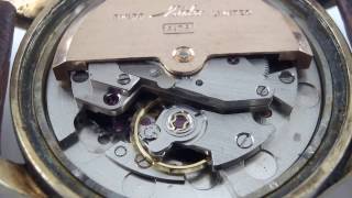 mido multifort superautomatic wrist watch movement cal.917p running.