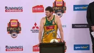 Clint Steindl addresses the crowd following Tasmania's title triumph