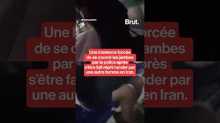 Iranian woman forced to cover her legs after being reprimanded by another woman