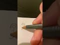 Petit tuto pour faire une oreille avec une pierre en 15 secondes #dessin #art #shorts