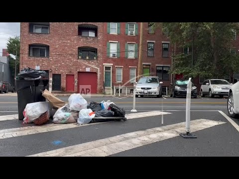 Philadelphia city workers' strike that includes trash collectors in its second day