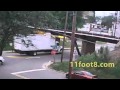 Truck smashes front of the box at the 11foot8 bridge