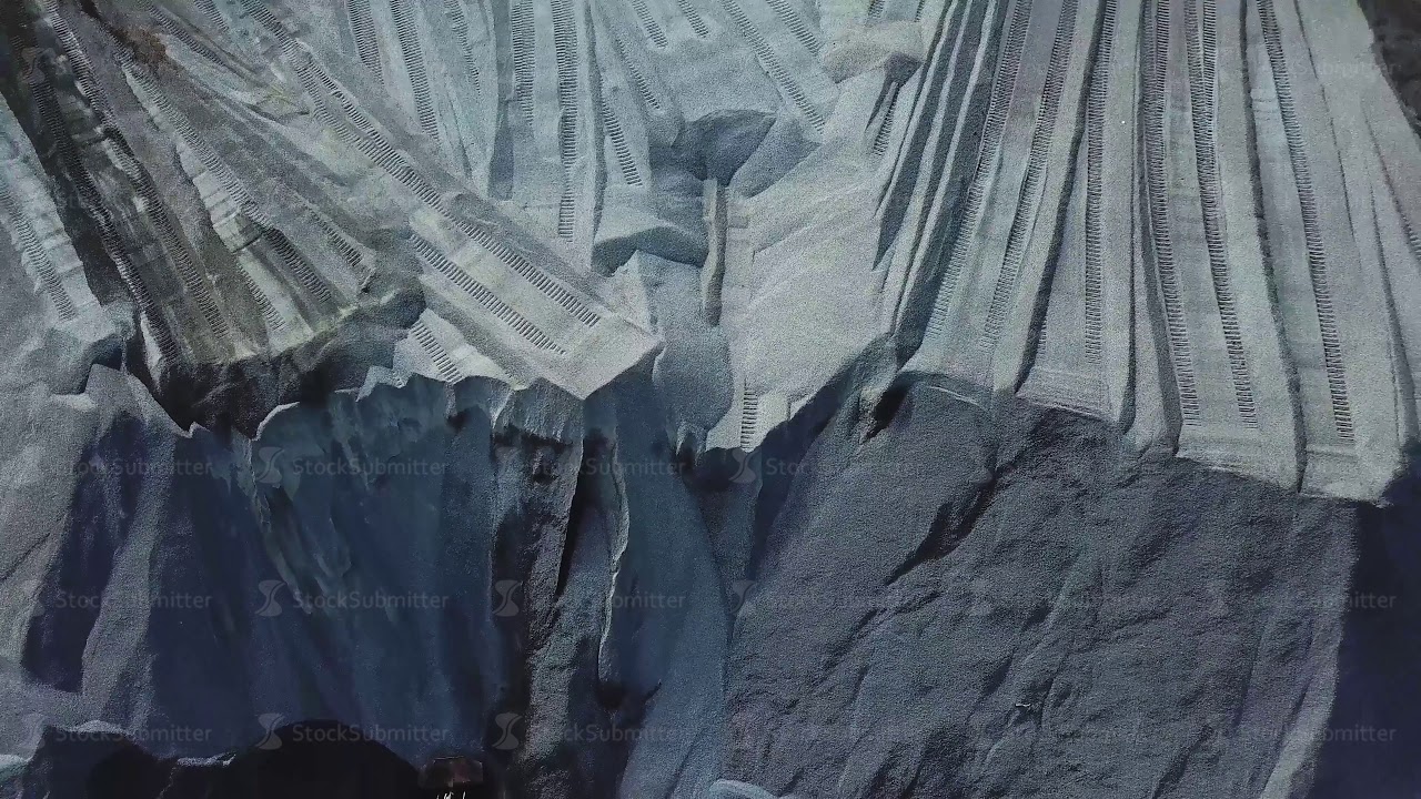 Aerial view of industrial background with mineral mining quarry. Stock footage. Opencast sand mining