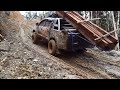 Toyota Hilux Wood Carrier On Muddy And Slippery Roads - Double Cab Truck Heavy Load In Muddy Roads