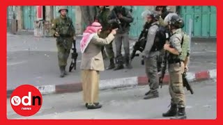 Elderly Palestinian Man Confronts Armed Israeli Soldiers Before Collapsing screenshot 1