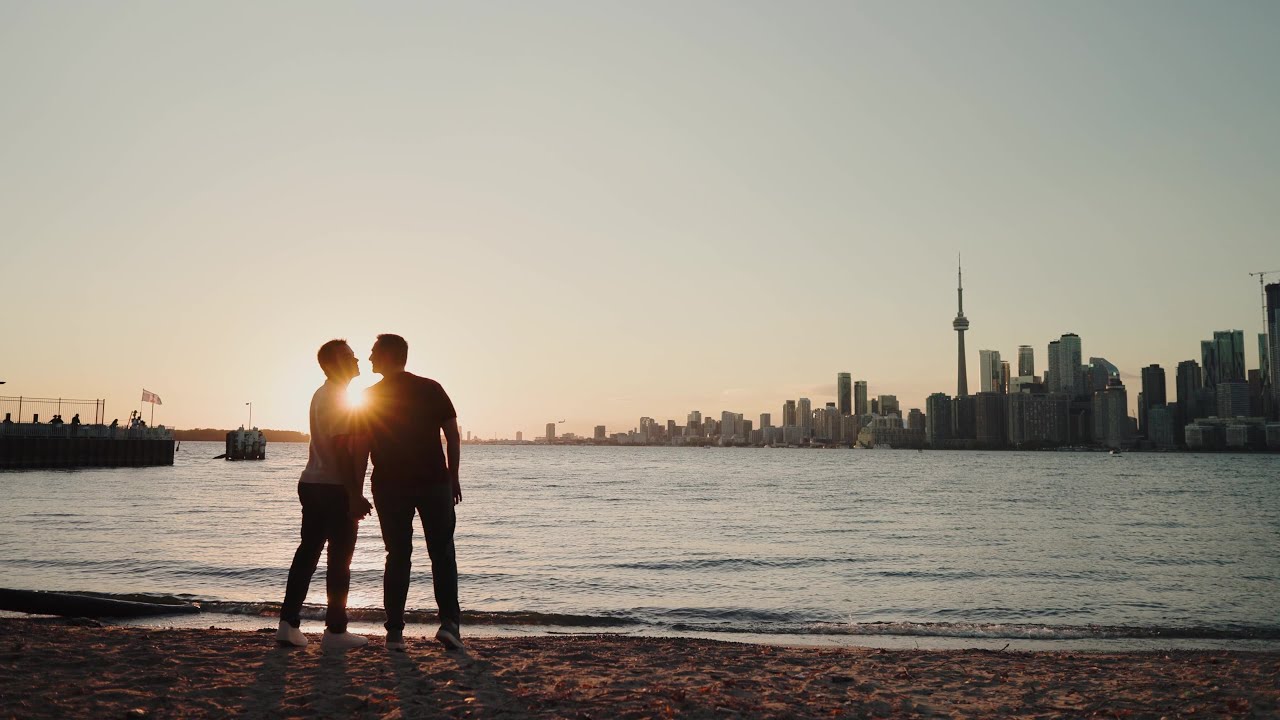 Engagement film still of Martin and Luc on Centre Island, Toronto