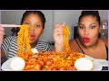 Cheesy fire noodles sausages eggs mukbang