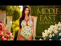4k ai lookbook middle east beautiful girl model  the gardens of a dubai mansion in spring