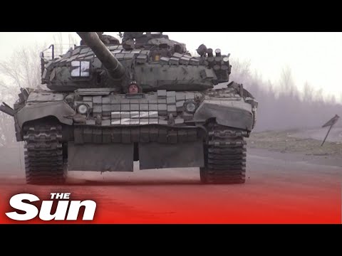 Russian 'Z tanks' travel through war-torn Mariupol, as residents dig graves