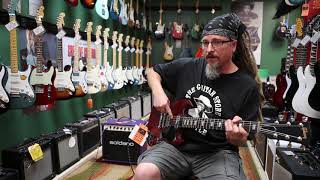 How to play a pick (pinch) harmonic | Teachers’ Tips | The Guitar Store