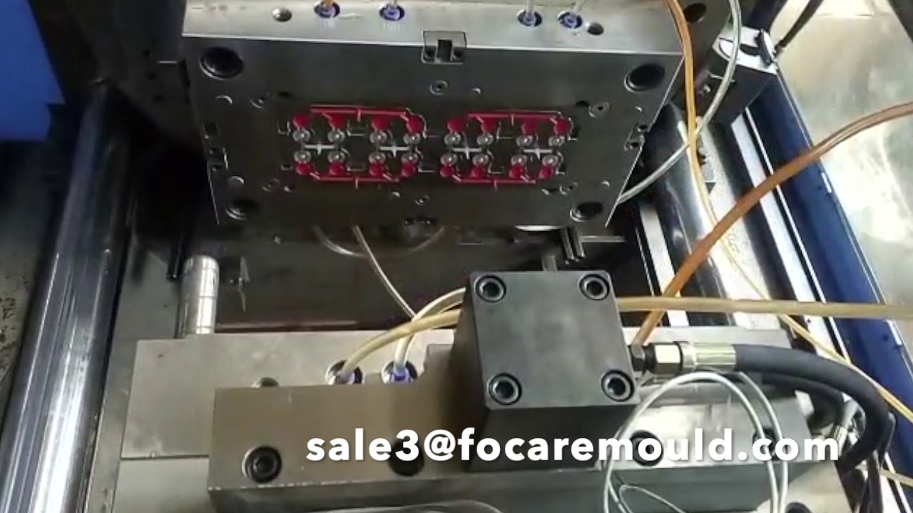 Two-color flip top cap mold