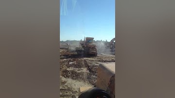 Cat 631E Pan rough inside cab view