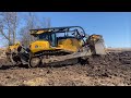 Pulling a huge John Deere dozer out of the mud