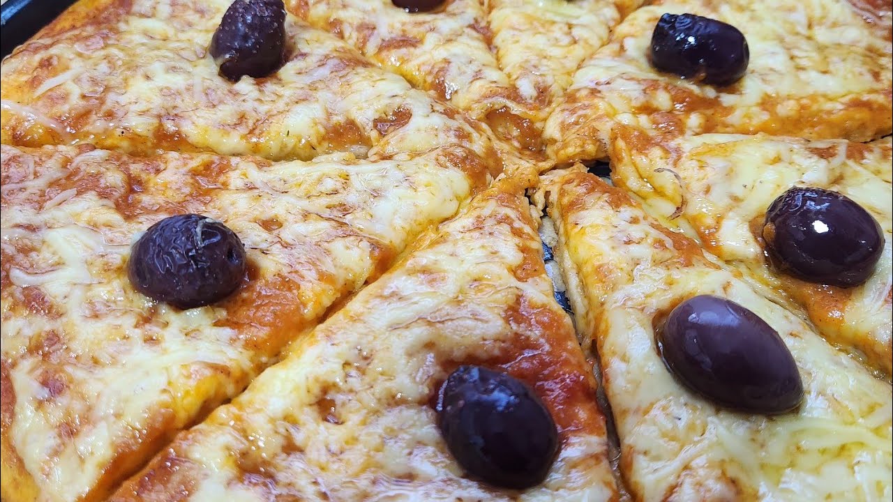 بيتزا باروع عجينة جربوها ورجولي لخبر 