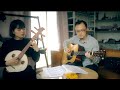 Traditional chinese instrumentalist play blugrass music ms ding and eric shi