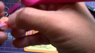 Heat embossing on a button