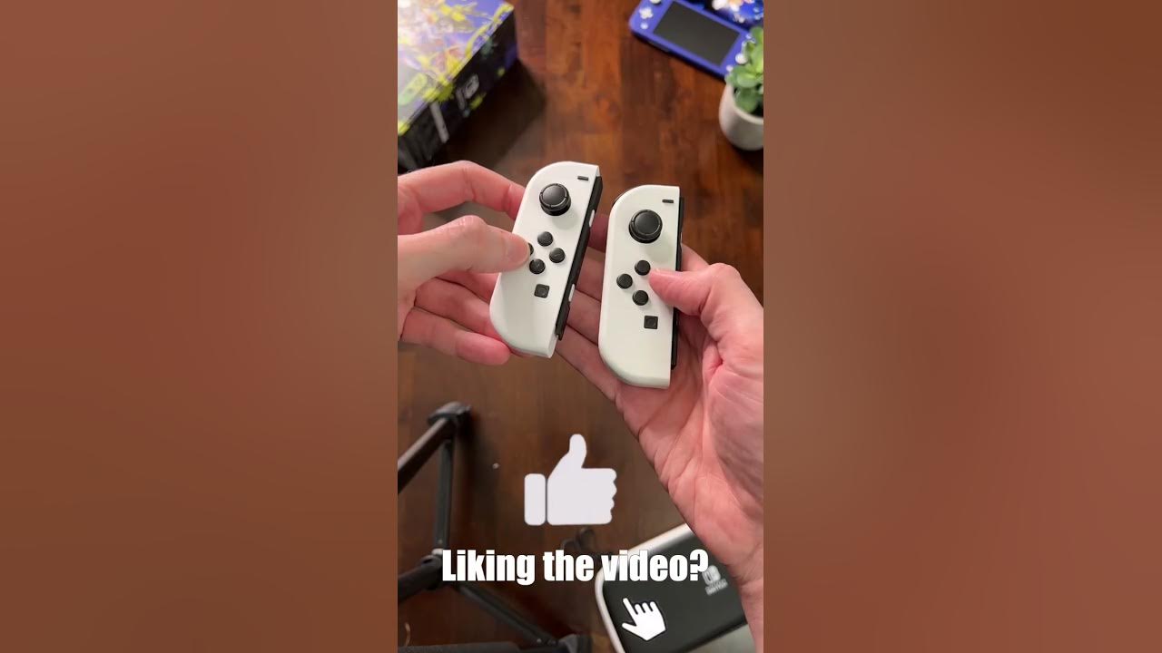 Nintendo Switch – OLED Model w/ White Joy-Con