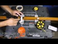 Installing a reel on a wooden speargun