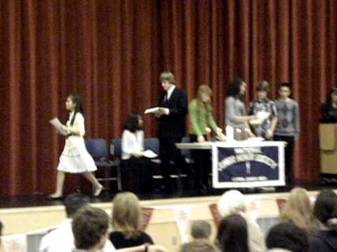 Sam Wensley being inducted into the National Honor Society at Curtis Junior High School.