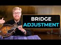 Perfect your mandolins playability  adjusting string action height with an adjustable bridge