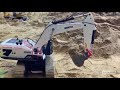 The new 2022 huina 1594 rc excavator 114 scale