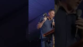 Greg Locke beats a Barbie house with a baseball bat
