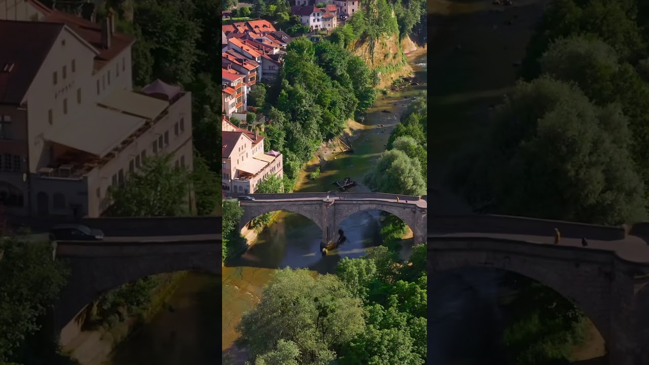 Stunning Drone Sunset Over Fribourg's Old Town in Switzerland 