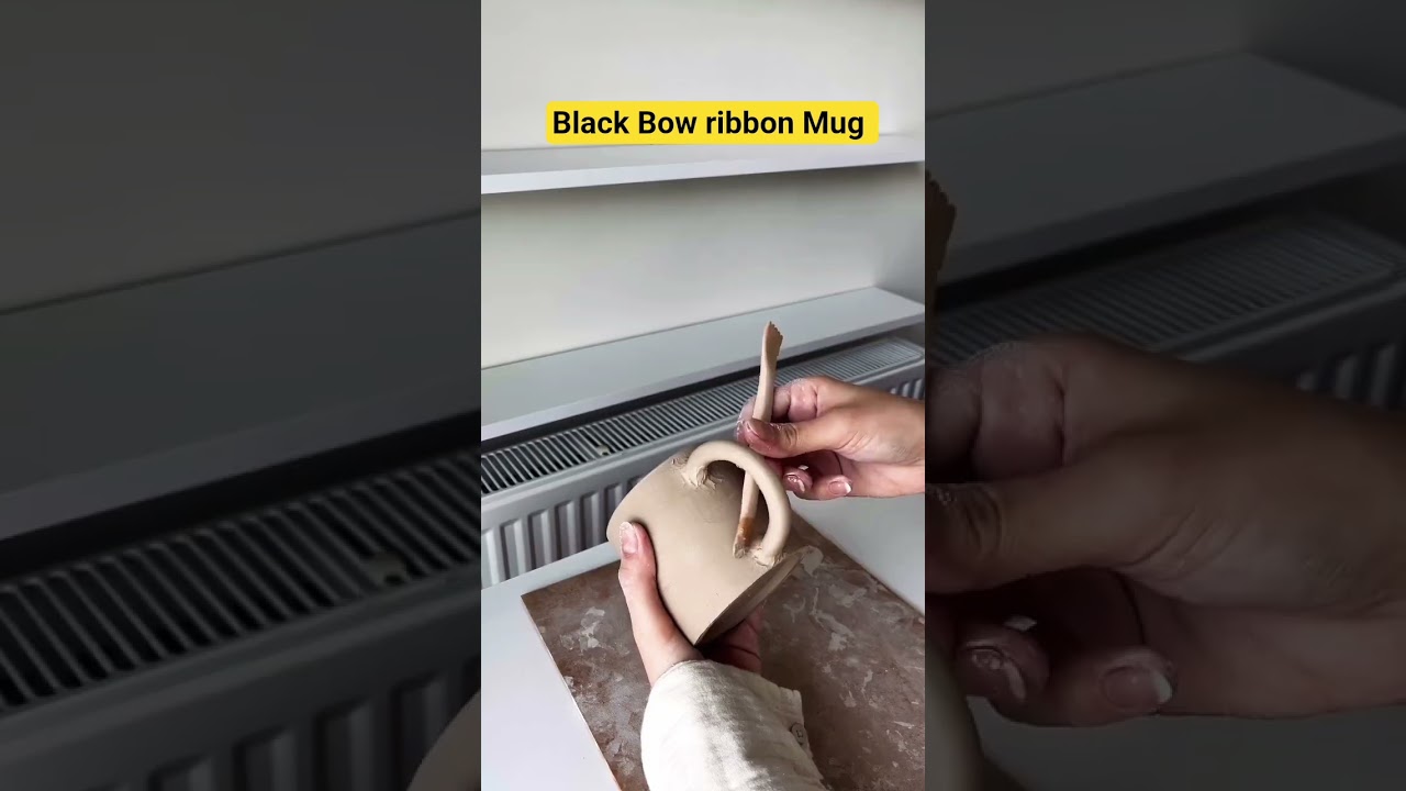 Clay Black Ribbon Mug .