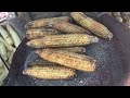 Making corn in hot salt  rostad corn by unique method