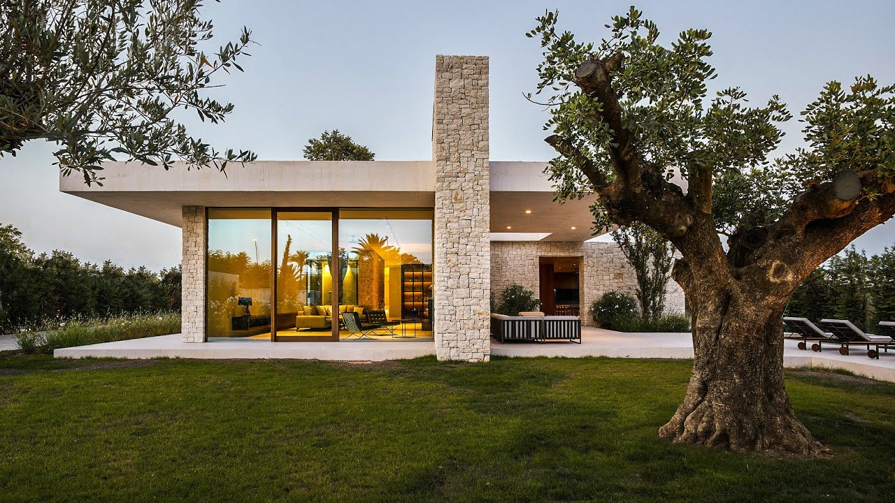 Beautiful modern spanish house with patios and pool | Casa Madrigal by Ramon Esteve Estudio