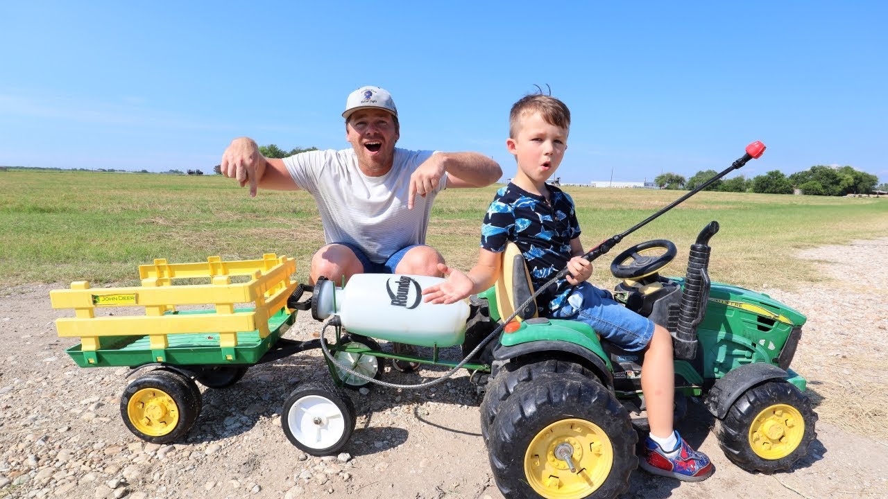 Using kids tractor after real tractor wont start Spray trailer for